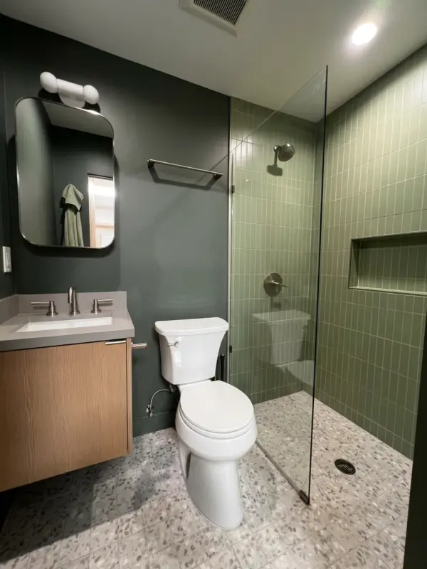 Finished bathroom with custom tile layout