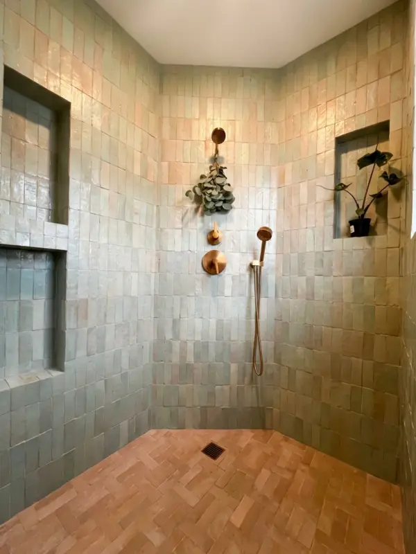 Terrazzo floor and fluted-wood vanity detail