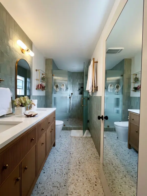 Sage zellige tile and brass shower fittings