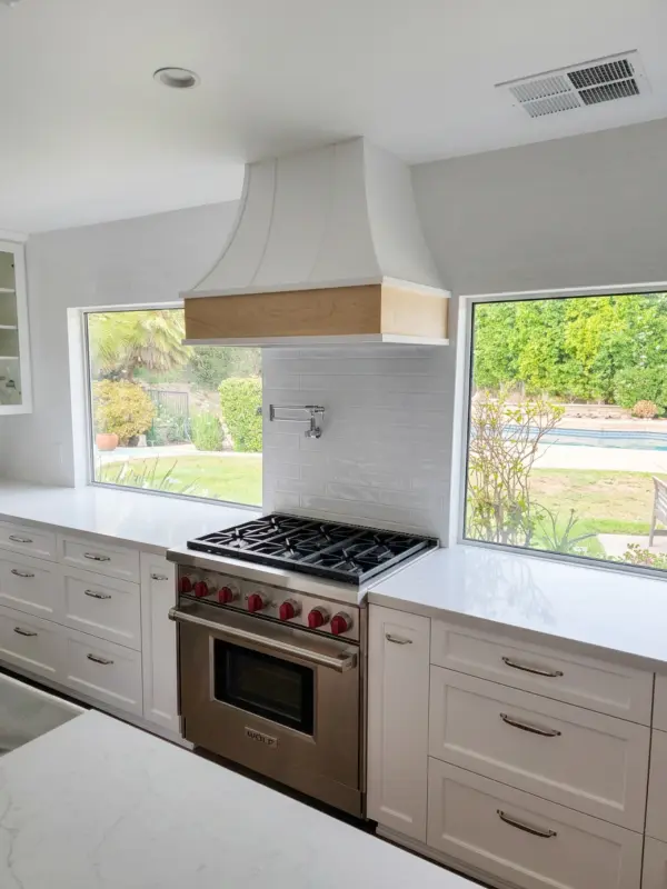 White shaker kitchen with a central island
